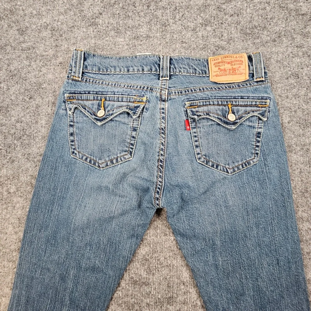 Vintage Levi's 542 Low Rise Flare Jeans Womens 12M Medium Wash Y2K Flap Pocket